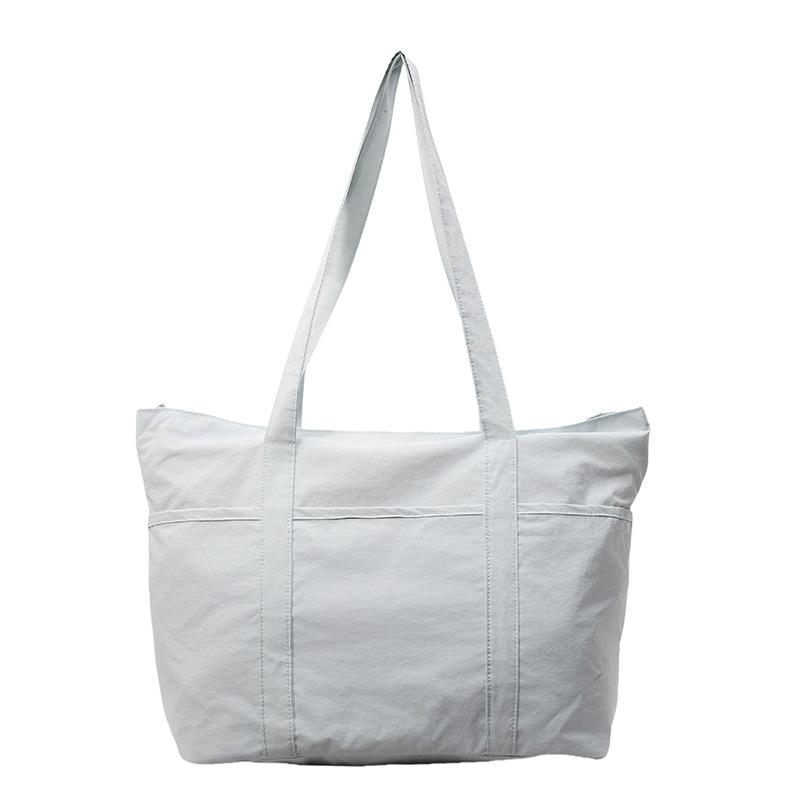 Simple solid color large-capacity tote bag women's new casual and lightweight shoulder bag, college student class cloth bag can be determined