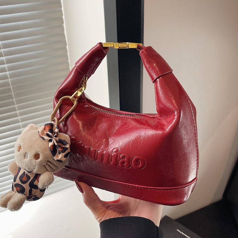 Trendy New Korean High-grade Texture Oil Wax Leather Hand-carried Dumpling Bag Temperament Versatile Commuter Women's Messenger Bag