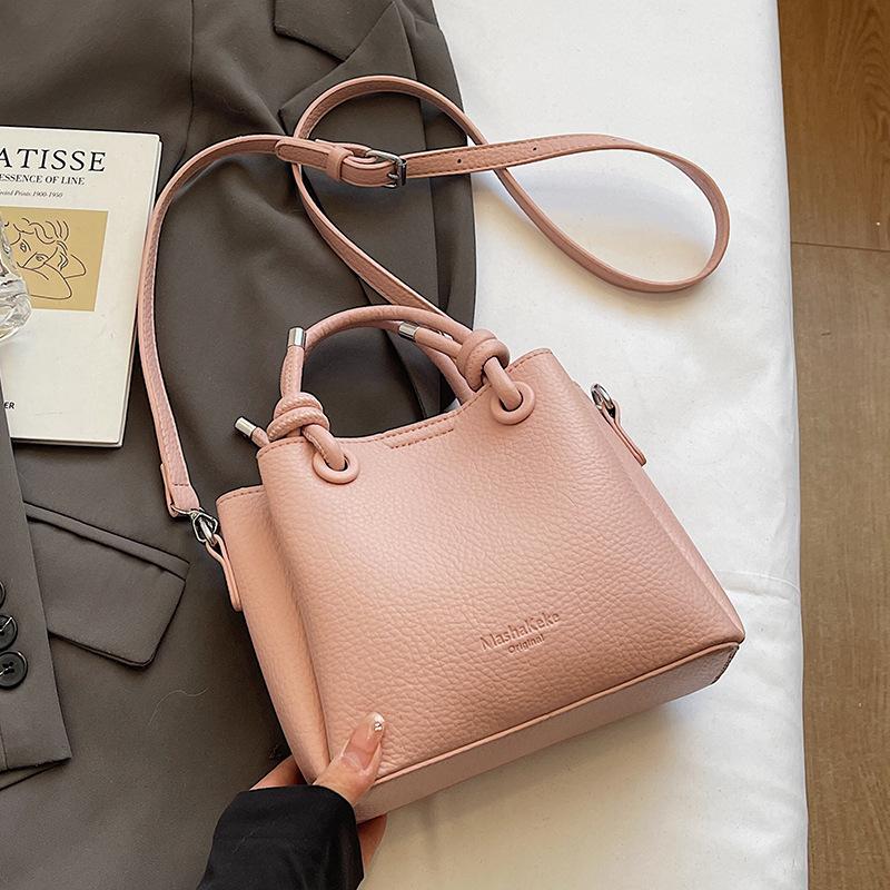 New trend casual simple wind portable bucket bag high-end lychee pattern messenger women's bag