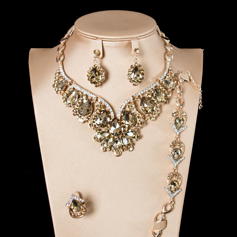 

Комплект из четырех украшений, модное ожерелье с драгоценными камнями, комплект серег, женская цепочка на ключицу, платье, аксессуары для банкета.