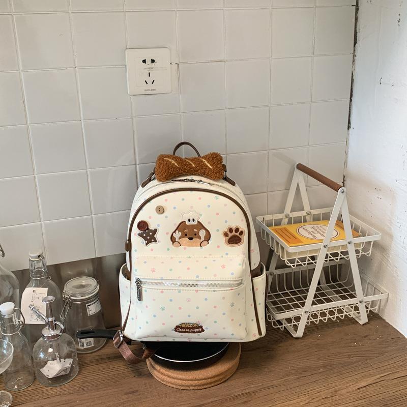 Schoolbag1011 New cartoon chef dog polka dot backpack female cute embroidered student schoolbag large capacity commuter backpack