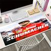 Michael Schumacher Motiv Mauspads, Rutschfeste Gummiunterseite, Multifunktionales Büro- & Wohnraumdekor, Perfekt zur Personalisierung des Arbeitsplatzes.