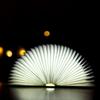 1Pc Leather Seven-color Book Light Led Creative Page Turning Book Light, Folding Desk Lamp Variable Night Light Souvenir