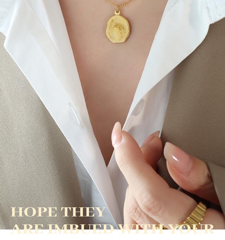 Gold-Plated Titanium Steel Heart Pendant Necklace with Embossed Design - European/American Style