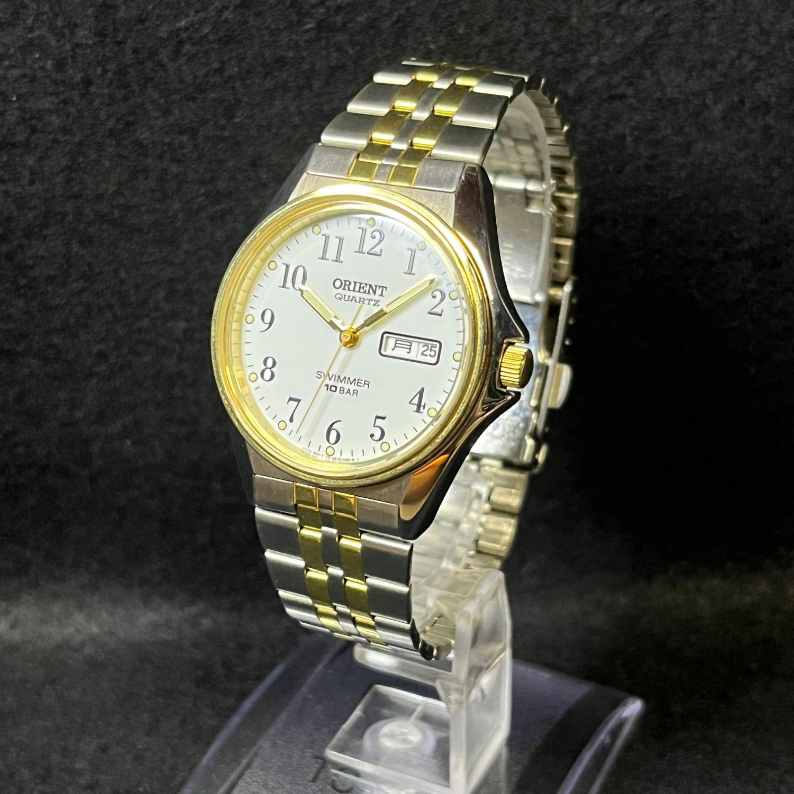 Used [Working item] ORIENT SWIMMER 100 UG1Q-B0-C wristwatch Orient operation confirmed battery replaced