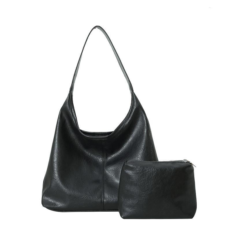 

Soft-faced tote bag women s new high-end texture mother and child armpit bag commuter shoulder bag чорний
