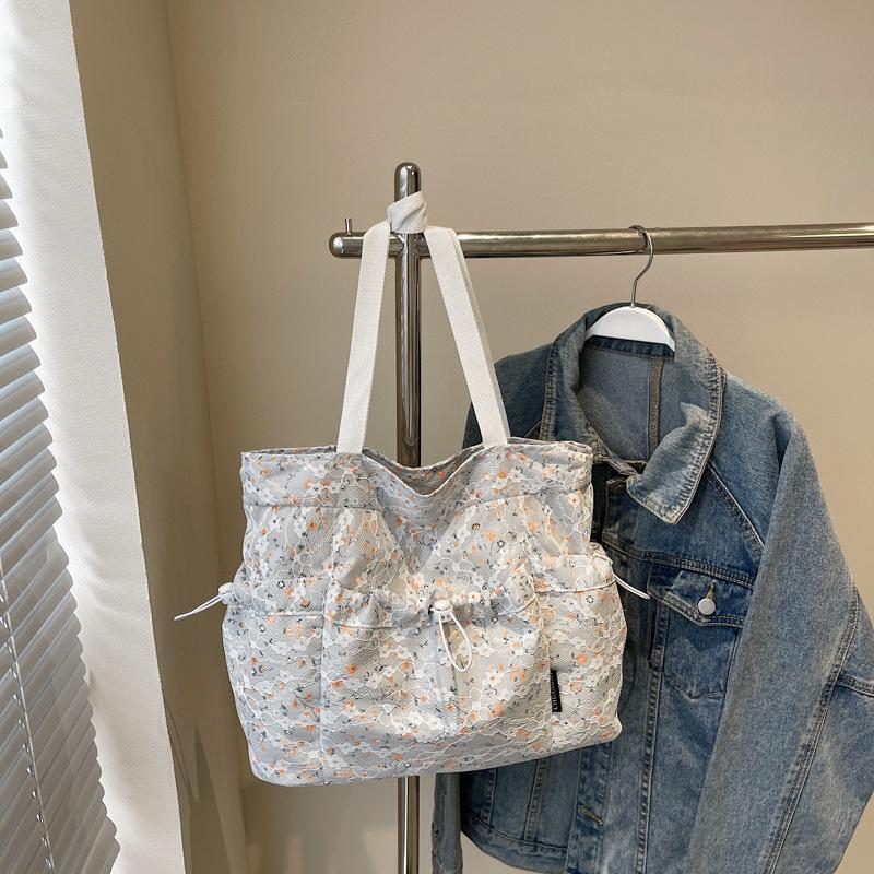 

Niche design cloth bag women s summer new large-capacity floral handheld cloth bag literary tote bag серый