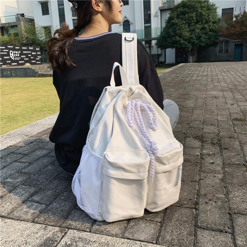 School bag female ins style, Korean version of college student backpack junior high school Mori vintage sense pumping belt versatile canvas backpack
