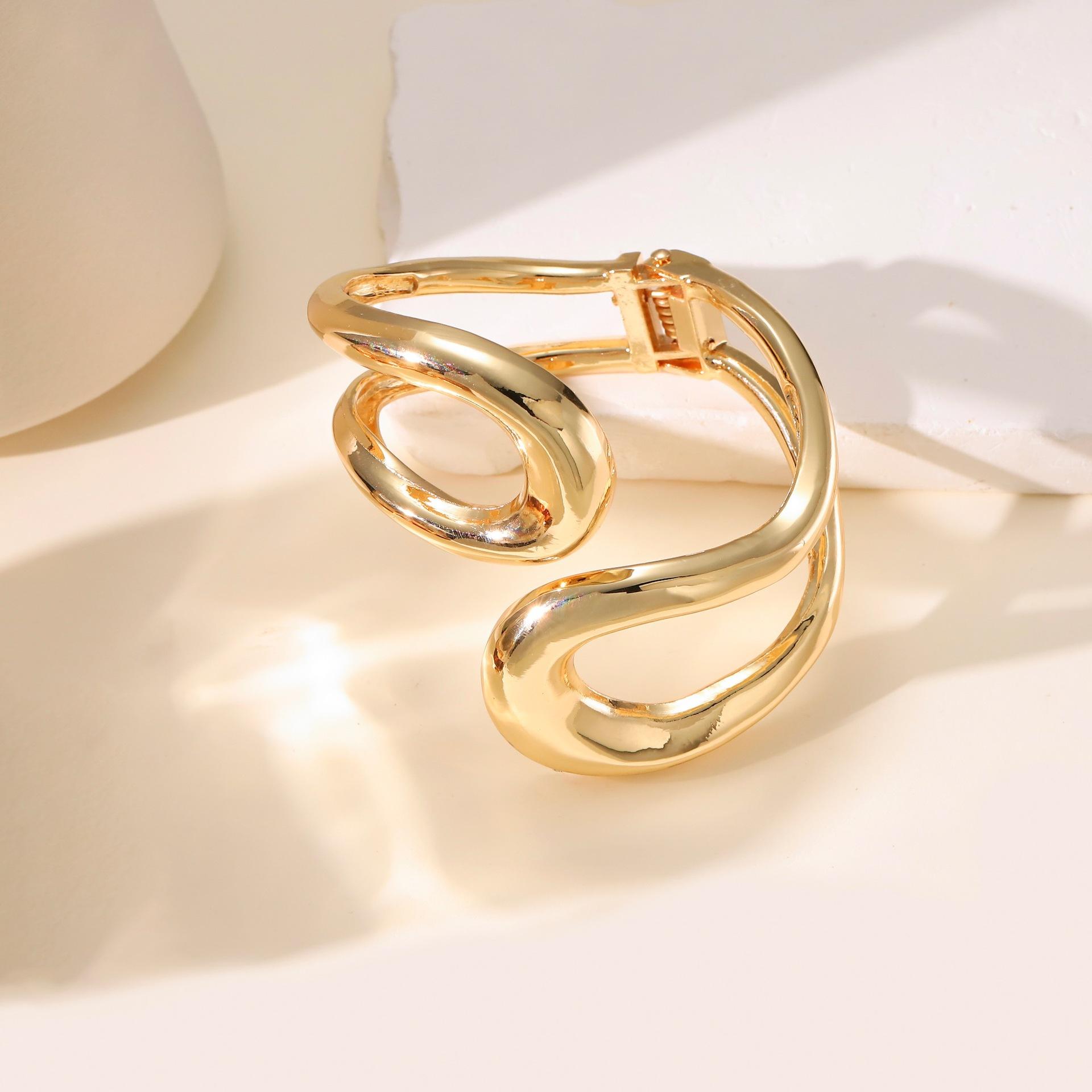 Hollow asymmetric alloy niche double-line geometric gold-plated bracelet simple atmosphere Hollow bracelet