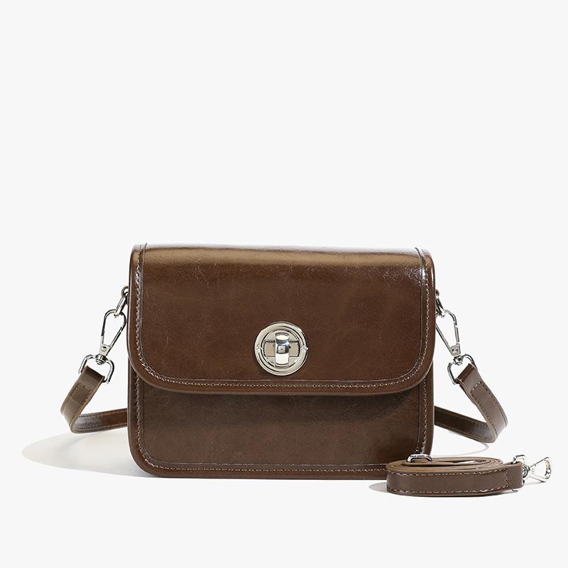 

Bag women s 2025 spring and summer niche simple fashion small square bag Korean version of high-end trend versatile casual shoulder bag темно-коричневого