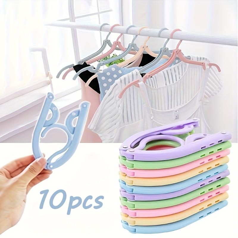 

10 Portable Folding Hangers with Anti Slip Handles Suitable for Travel, Home, and Dormitory Use Multi Functional Clothes Hanger