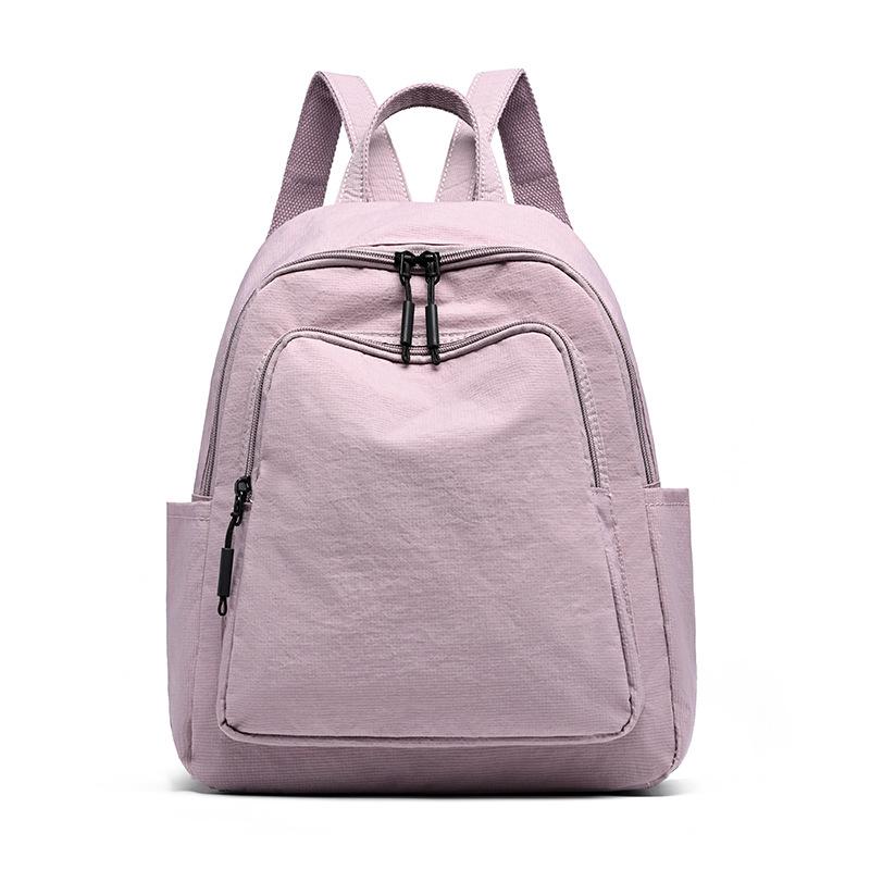 Schoolbag1011 New Simple Casual Backpack Women's Versatile Commuter Large Capacity Backpack Go Out and Play Lightweight Mountaineering Bag