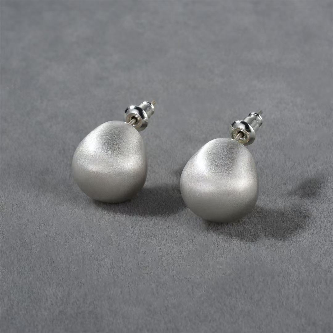 

2024 Cold Style Metal Brushed Stud Earrings: Unique, Simple Design for Women