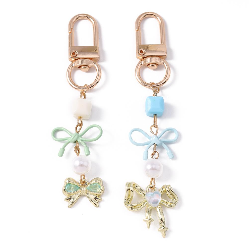 Feminine Key Ring Elegant Sweet Heart Charm Key Ring Cute Keychain High-Quality Bow Pearl Keychain For Gifts Key Organizer Bag