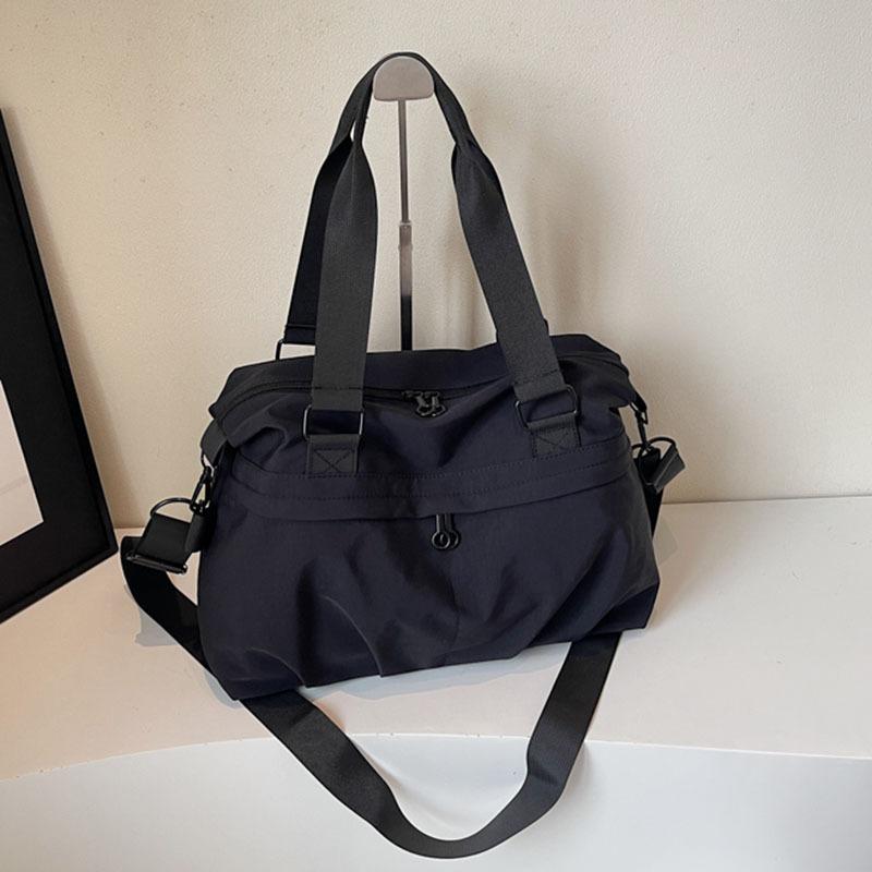 Canvas bag women's large-capacity new autumn and winter versatile simple messenger bag college student commuter tote bag