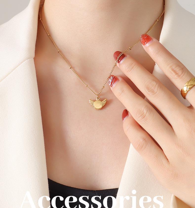 Gold-Plated Geometric Wing Pendant Necklace: Japanese-Korean Design with Titanium Steel Clavicle Chain