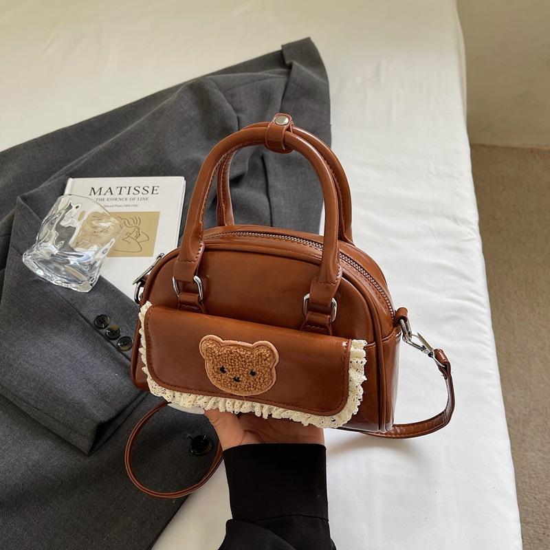 

Simple small bag women 2025 new niche foreign shoulder bag messenger bag Korean version fashion portable small square bag коричневый