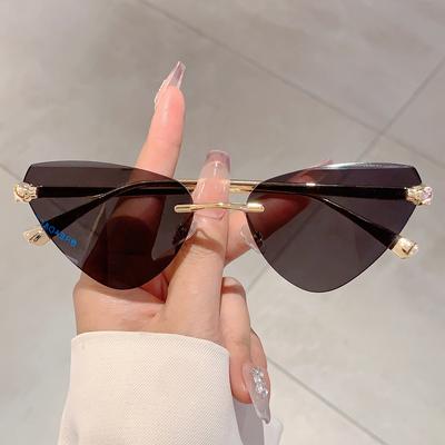 Gafas de sol triangulares sin montura estilo ojo de gato para mujer y hombre, de marca de lujo, estilo punk, con diseño de leopardo.