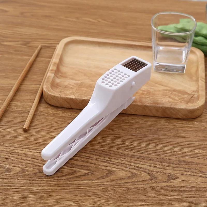 Multifunctional Garlic Press, Manual Cutting of Slices, Masher, Cleaning Brush, Wish Amazon Cross-bo