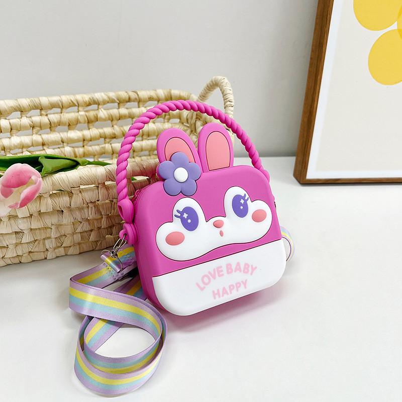 Entzückender Regenbogen-Cartoon-Silikon-Kinderrucksack mit 3D-Kaninchenlächeln und stilvollem Design