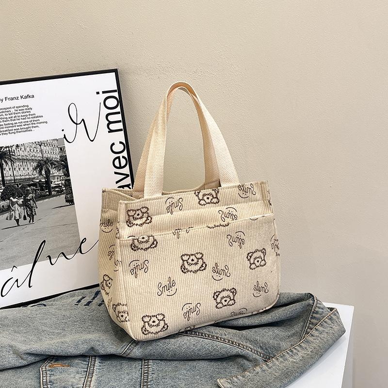 

New fashion handbag, beautiful, casual, light and large-capacity handbag, trendy cartoon printing, cute storage bag белый
