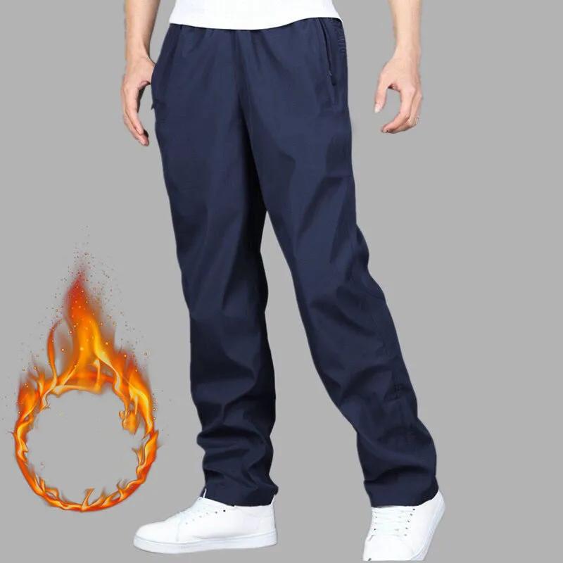 

Чоловічі зимові флісові потовщені спортивні штани великого розміру вільного крою вітрозахисні повсякденні штани 3XL темно-синього кольору