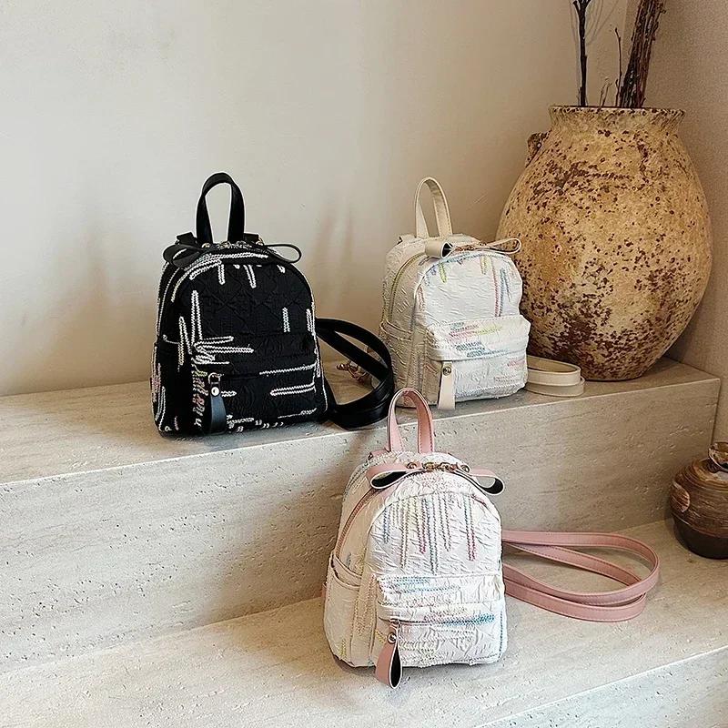 Sac à dos produit à fermeture éclair en nylon de couleur unie, ceinture à coussin d'air, sac à dos de mode haute beauté, nouveau sac souple style universitaire