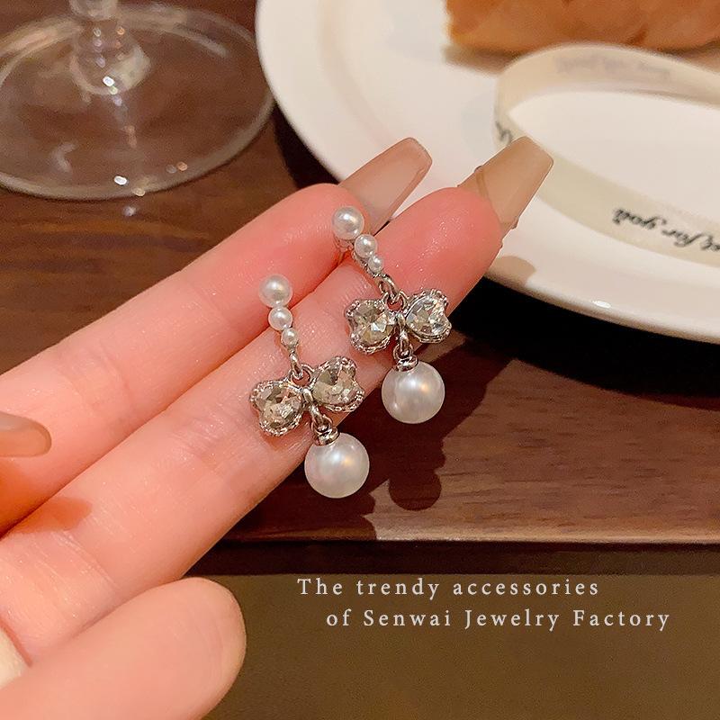 925 Silver Needle Pearl Earrings Women's High-end Sense Niche Temperament Bow Stud Earrings Retro Ear Jewelry Wholesale