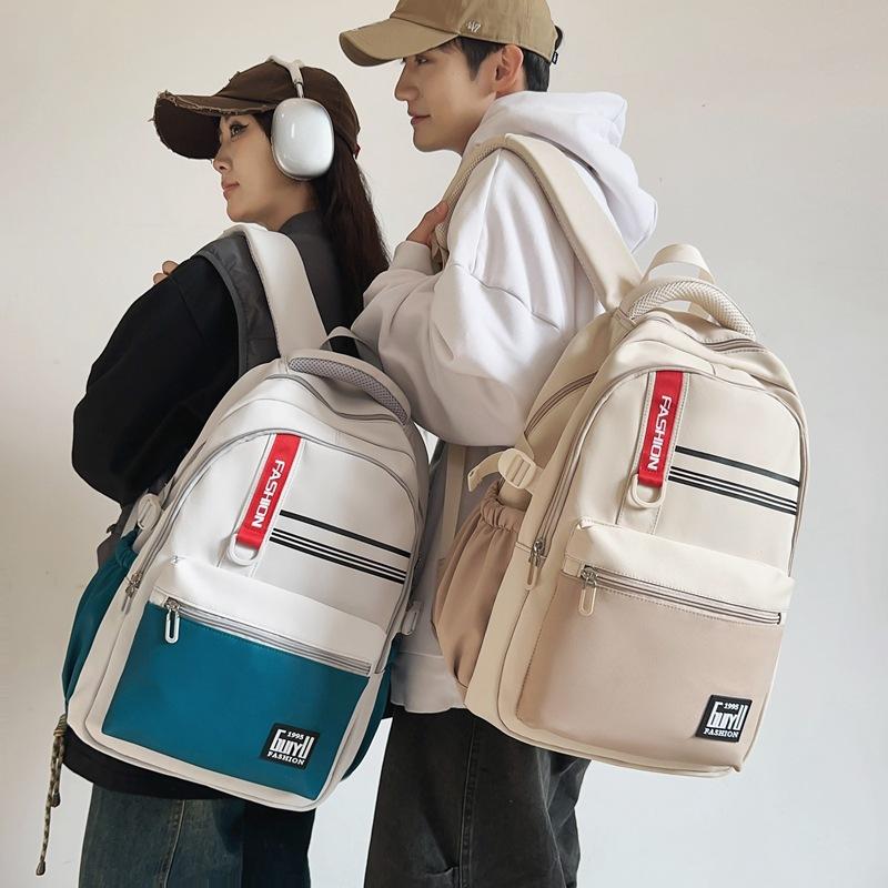 

New Style of High School Students with High School Students with Large Capacity Reduction and Lightweight Backpacks for Simple Textured Backpacks
