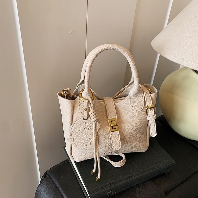 Simple hand bucket bag, new fashionable versatile shoulder bag, high-end trendy messenger bag