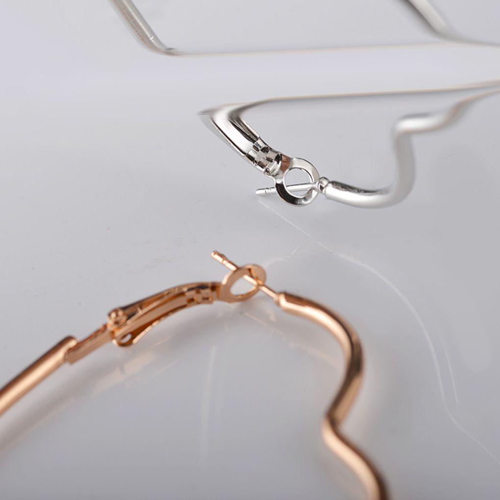 Neue Mode Hohle Pfirsichherz Ohrringe Plattierte Ornamente Einfache Hängeohrringe Für Frauen Kupferschmuck