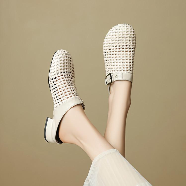 Design sense Roman woven hollow bag head cool slippers 2025 summer new wear round head thick heel muller shoes women