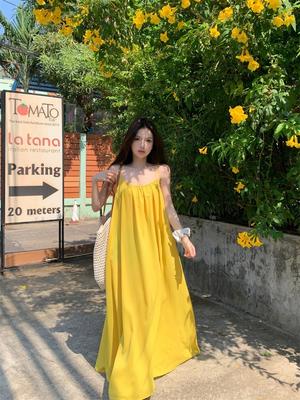 Seaside Vacation Sexy Backless Suspender Dress Women's Summer New Loose A-word Skirt Gentle Yellow Long Skirt