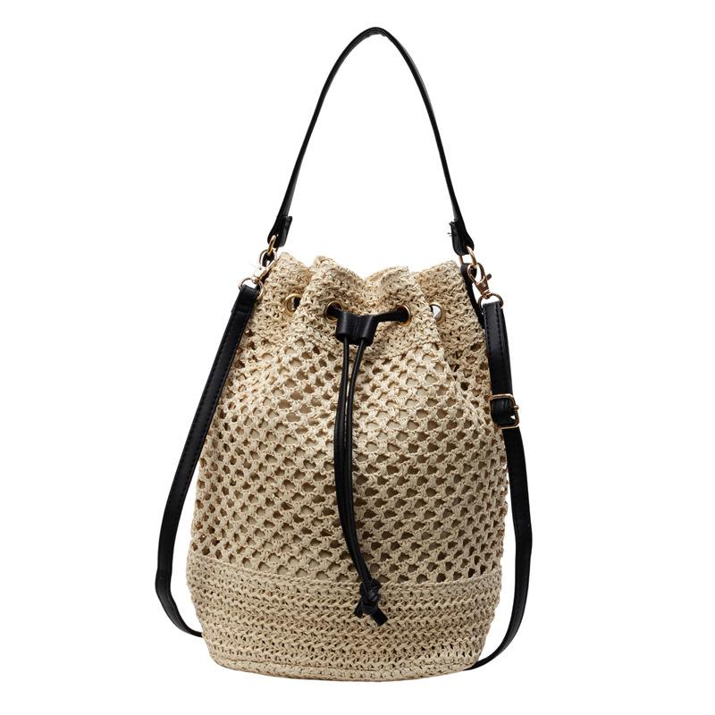 Spring and Summer New Fashion Mori Hollow Woven Portable Bucket Bag Fashion Leisure Commuting Vacation Drawstring Messenger Bag