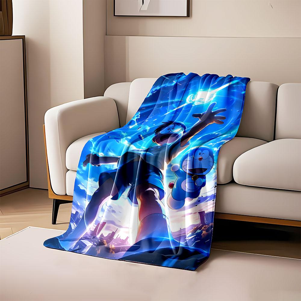 

A boy and a blue character reach toward a glowing orb in the sky. for all seasons blanket lunch break throw gift 80cm x 120cm