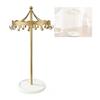 Iron Jewelry Display Stand with a Rotatable Upper Frame, Multiple Hanging Positions, and a Round Tray for Dresser Storage and Presentation