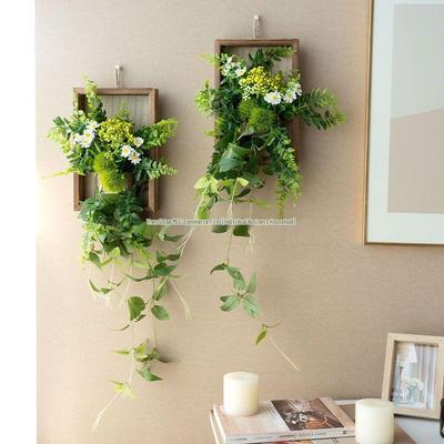 Daisy 3D Floral Wall Decor: Artificial Green Plants Hanging Ornament for Luxurious Living Room.