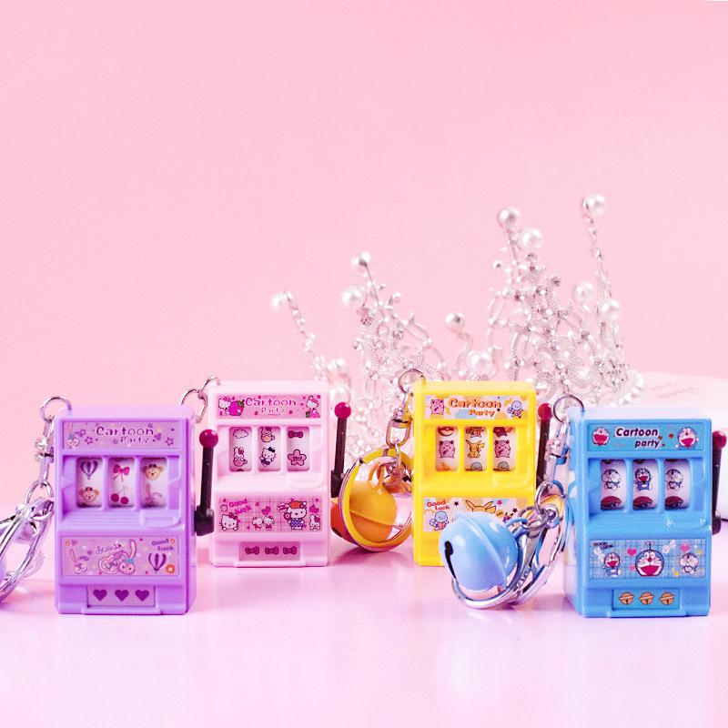 Mini Cartoon Fruit Machine Game Keychain: Playable, Spinning Toy with Rocking Lucky Draw Feature