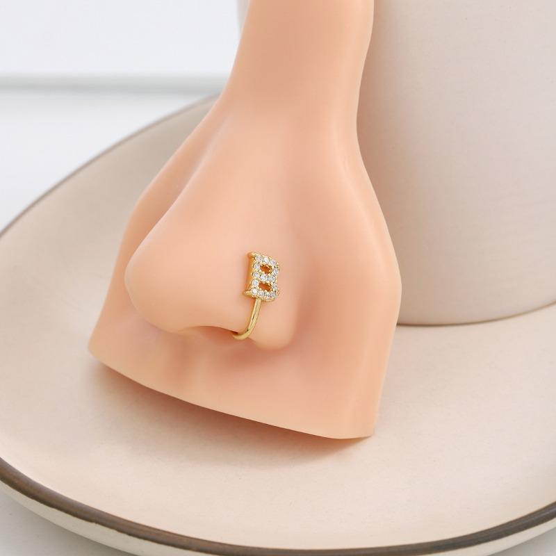 A 26-letter U-shaped Diamond-encruted Nose Stud Without A Pungent Clip