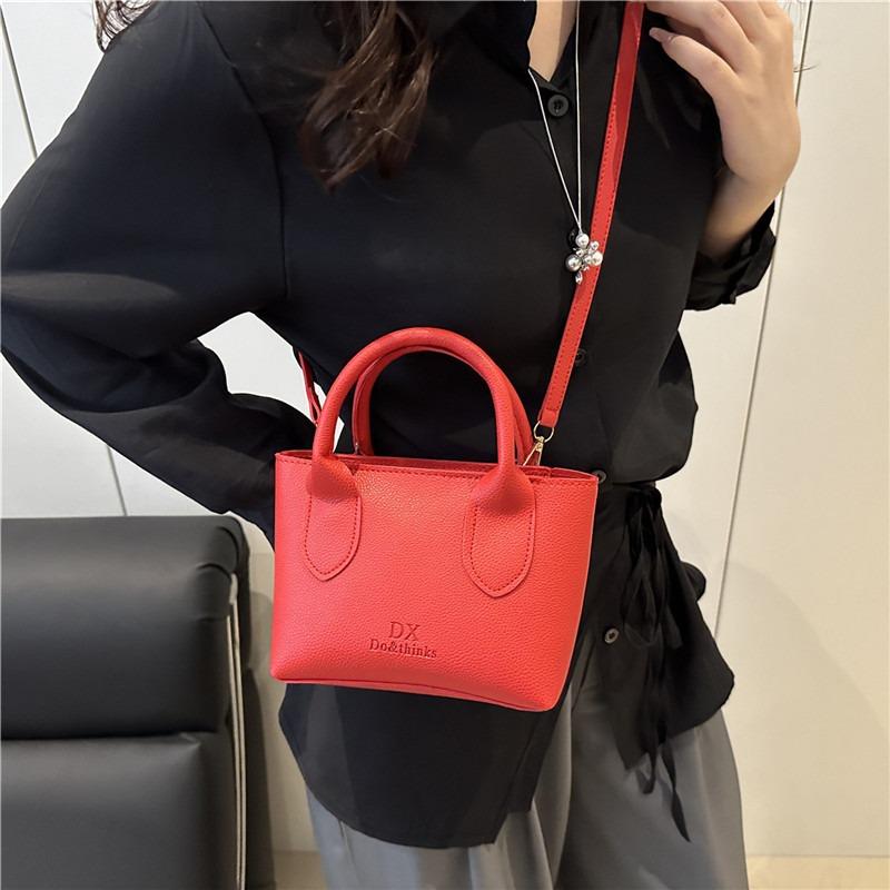 Sommer neue Mode einfach einfarbig atmosphärisch tragbare Bucket Bag Damen Pendler Schulter Messenger Bag