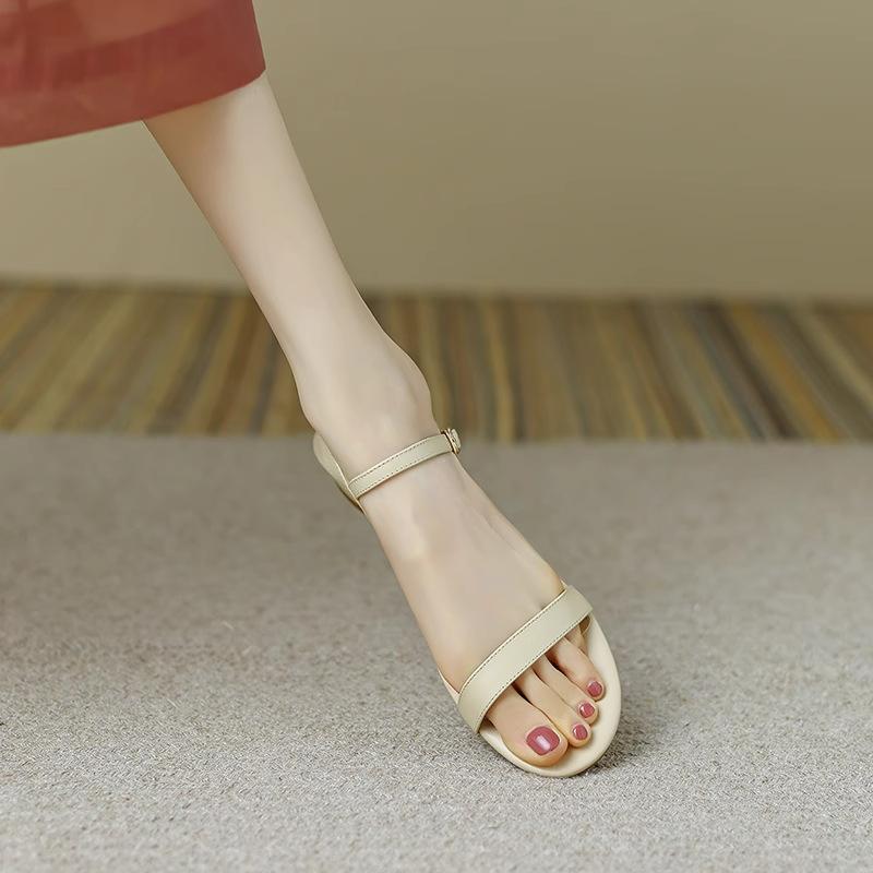 Leather Open-toed Sheepskin Sandals Women's New Simple and Versatile Flat-bottomed Fairy Style French Low-heeled One-word Button Roman Shoes