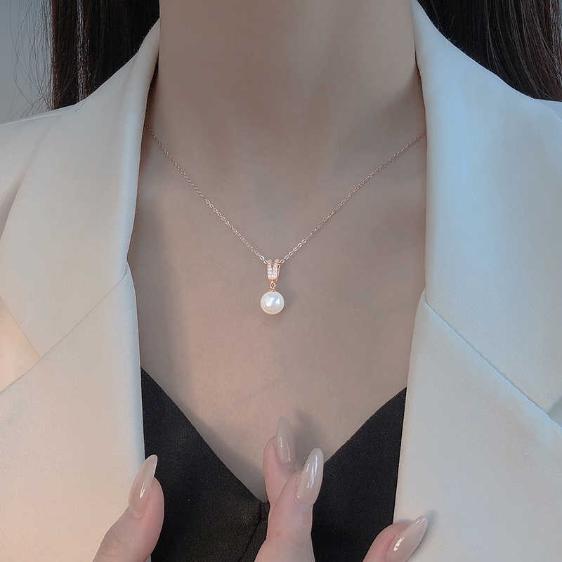 

Жемчужное ожерелье женская мода легкая роскошь элегантное ретро геометрический V-образный жемчужный кулон