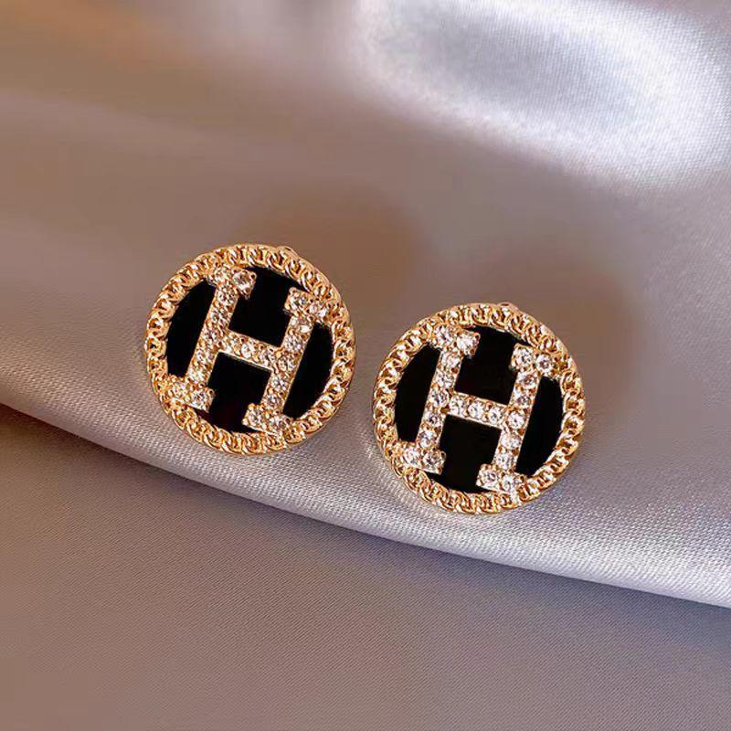 Elegant Gold-Plated Black Zircon Stud Earrings - Niche Design for a Luxurious Fashion Statement
