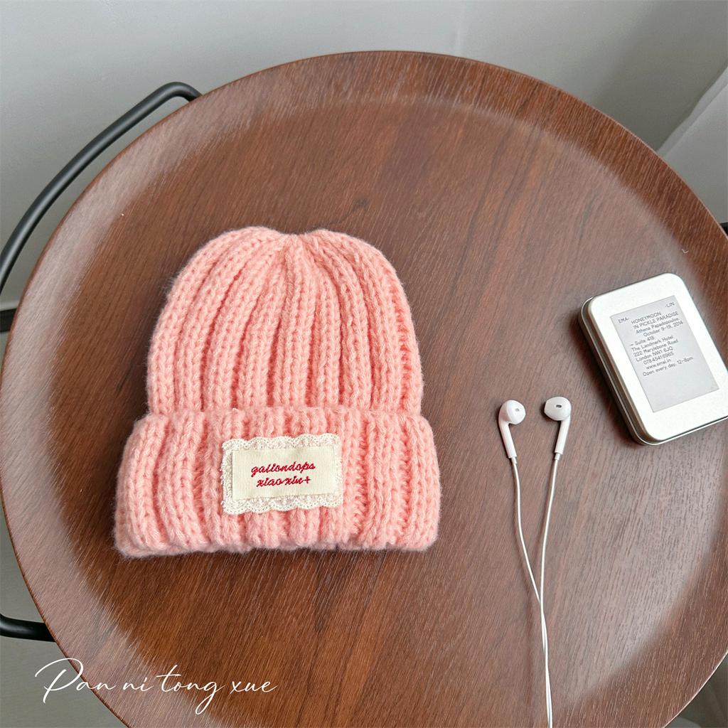 Neue Spitze Etikett Kinder Wollmütze Nuojiji Student Herbst und Winter Neu Warm und Vielseitig Ohrenschutz Strickmütze