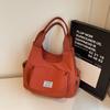 Neue japanische minimalistische Canvas-Einfache Tragetasche Damen Modisch und Vielseitig Kleine Umhängetasche Lässiges Design Pendeltasche