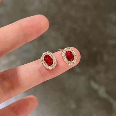 Brincos de pino de ovo de ganso femininos leves de luxo nicho micro-incrustado zircão vermelho flash oval joias de orelha