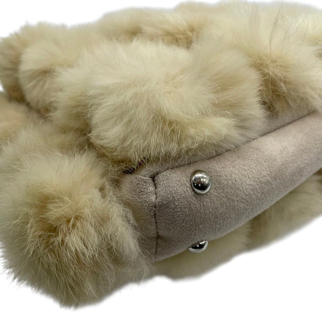 Used courregesShoulder Bag beige/Ivory fur/Suede Women