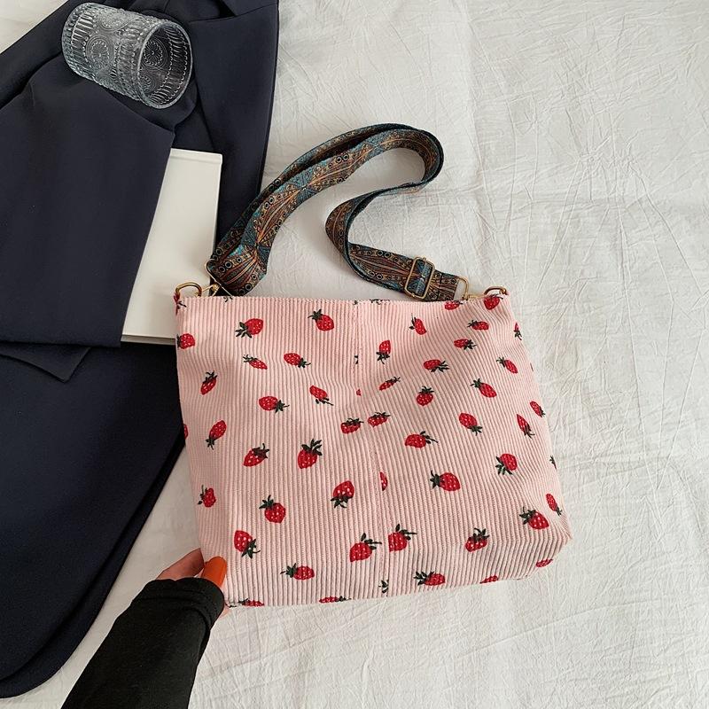 

Popular corduroy strawberry printed bag women s Korean version 2025 summer new shoulder messenger bag tote bag