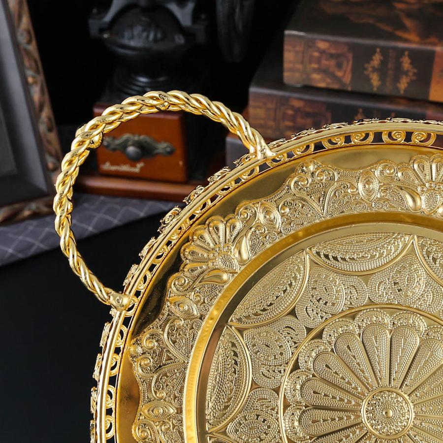 Ny europeisk lätt lyxig ihålig fruktskål i legering, rund stor fruktskål, förvaring av nötter och snacks i vardagsrummet