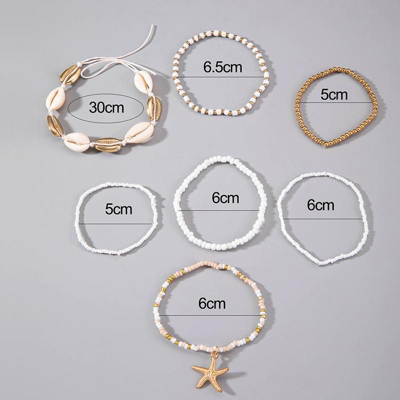 Set da 7 Pezzi Stile Bohémien Resort Braccialetto Intrecciato con Perline di Conchiglie Set di Braccialetti con Perle di Riso Stella Marina Stile Spiaggia Per Donna